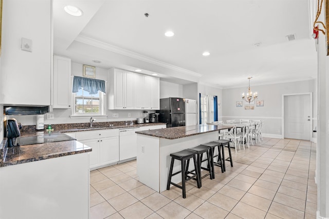 400 Hillside Dr S, North Myrtle Beach, SC 29582 - kitchen with freestanding refrigerator, dishwasher, range, light tile patterned flooring, and a kitchen island