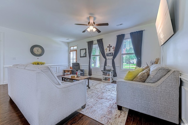 548 Fox Chase Dr, Conway, SC 29527 - living room with a ceiling fan, wainscoting, and dark wood-style flooring