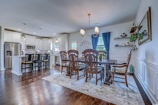 548 Fox Chase Dr, Conway, SC 29527 - dining space with a chandelier, wainscoting, dark wood-style flooring, and recessed lighting