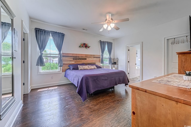 548 Fox Chase Dr, Conway, SC 29527 - bedroom with wood finished floors, ceiling fan, baseboards, and ensuite bathroom