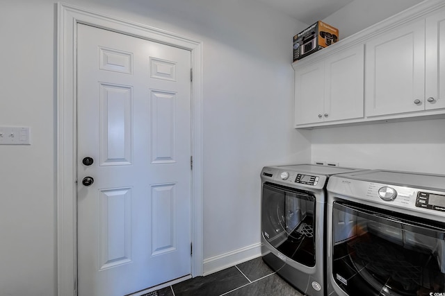 548 Fox Chase Dr, Conway, SC 29527 - washroom with cabinet space, independent washer and dryer, dark tile patterned floors, and baseboards
