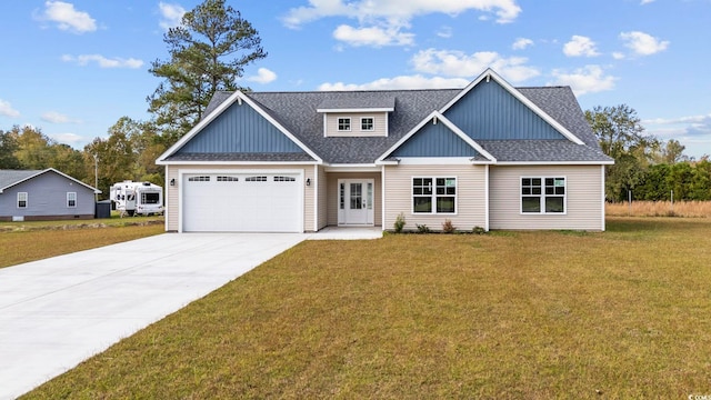 1900 Blue Bird Rd, Loris, SC 29569 - view of front of property with a shingled roof, driveway, a front lawn, and a garage