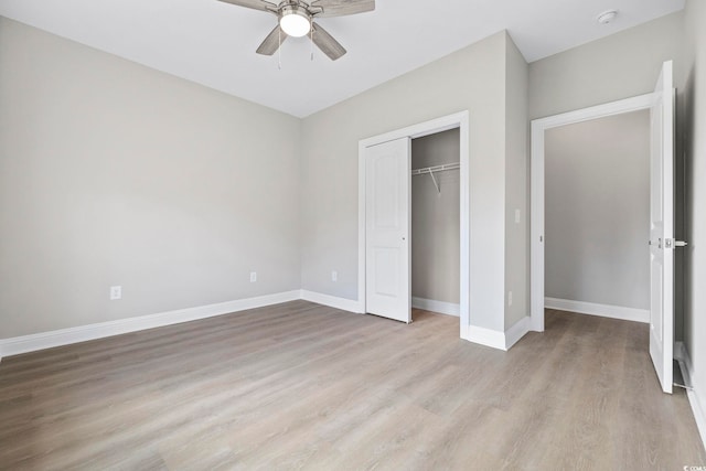 1900 Blue Bird Rd, Loris, SC 29569 - unfurnished bedroom featuring light wood-type flooring, a closet, and a ceiling fan