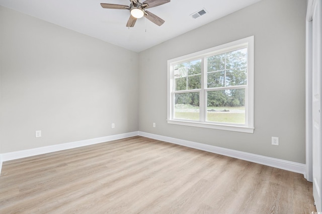 1900 Blue Bird Rd, Loris, SC 29569 - empty room with light wood-style floors and ceiling fan