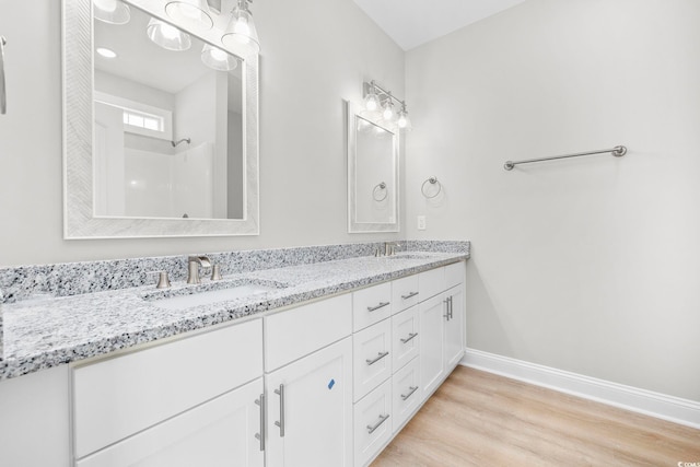 1900 Blue Bird Rd, Loris, SC 29569 - bathroom featuring double vanity and wood finished floors