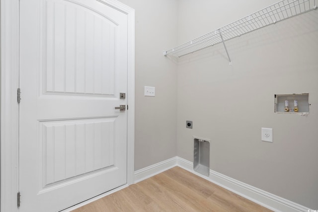 1900 Blue Bird Rd, Loris, SC 29569 - laundry room with hookup for an electric dryer, washer hookup, and light wood finished floors