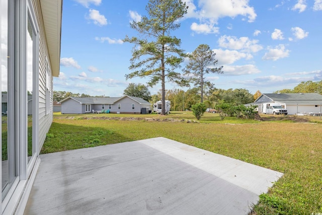 1900 Blue Bird Rd, Loris, SC 29569 - view of grassy yard featuring a patio