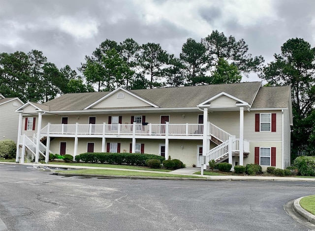 3677 Clay Pond Village Ln Unit 6, Myrtle Beach, SC 29579 - view of front of house featuring stairway and roof with shingles