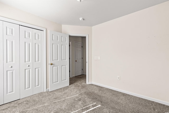 2336 Windmill Way, Myrtle Beach, SC 29579 - unfurnished bedroom with carpet floors, baseboards, and a closet