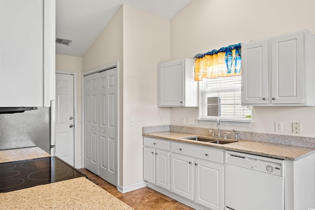 2336 Windmill Way, Myrtle Beach, SC 29579 - kitchen with white dishwasher, a sink, white cabinets, range with electric cooktop, and light stone countertops