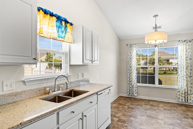 2336 Windmill Way, Myrtle Beach, SC 29579 - kitchen featuring white dishwasher, a sink, hanging light fixtures, a chandelier, and light stone countertops