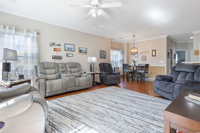 5822 Longwood Dr Unit 104, Murrells Inlet, SC 29576 - living area featuring wood finished floors, ceiling fan, a chandelier, and crown molding