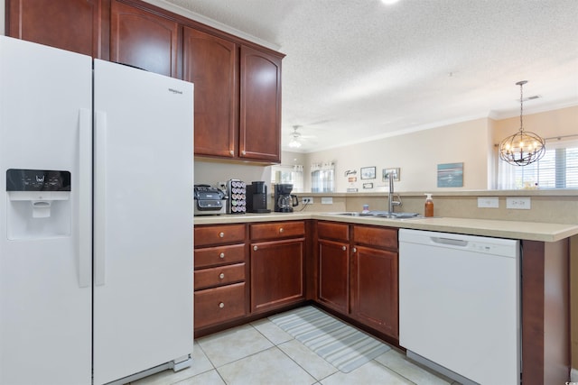 5822 Longwood Dr Unit 104, Murrells Inlet, SC 29576 - kitchen with white appliances, a sink, a peninsula, light countertops, and ornamental molding