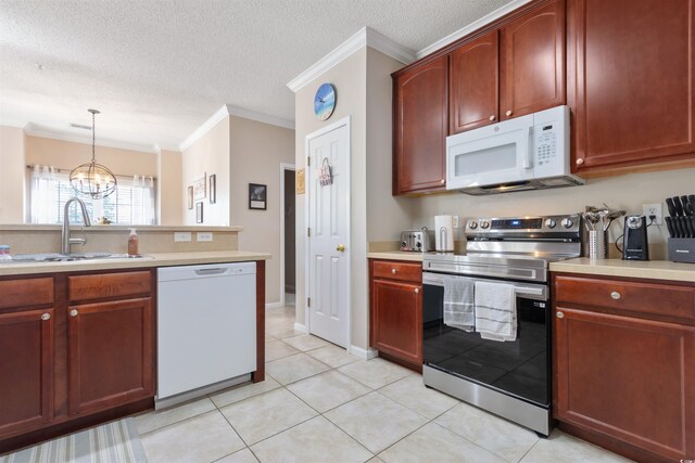 5822 Longwood Dr Unit 104, Murrells Inlet, SC 29576 - kitchen featuring white appliances, a sink, crown molding, light countertops, and a chandelier