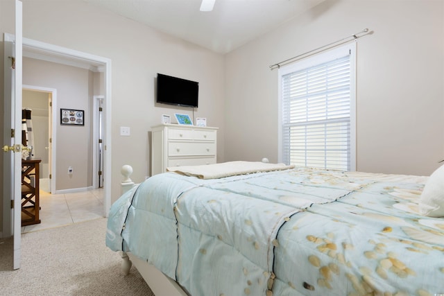 5822 Longwood Dr Unit 104, Murrells Inlet, SC 29576 - bedroom with light carpet, ceiling fan, and light tile patterned flooring