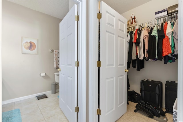 5822 Longwood Dr Unit 104, Murrells Inlet, SC 29576 - walk in closet with light tile patterned floors