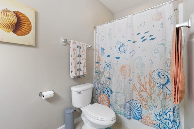 5822 Longwood Dr Unit 104, Murrells Inlet, SC 29576 - bathroom with toilet, curtained shower, and baseboards