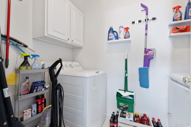 5822 Longwood Dr Unit 104, Murrells Inlet, SC 29576 - laundry area with washing machine and dryer and cabinet space