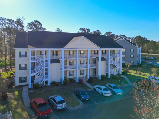 5822 Longwood Dr Unit 104, Murrells Inlet, SC 29576 - view of property with uncovered parking