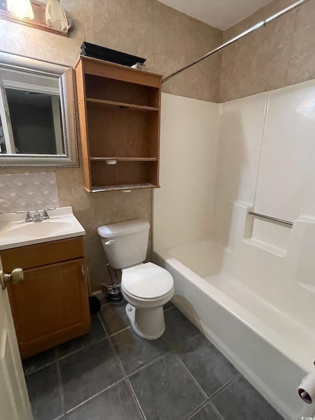 600 65th Ave N Unit 8, Myrtle Beach, SC 29572 - bathroom with toilet, tile patterned flooring, vanity, and tub / shower combination