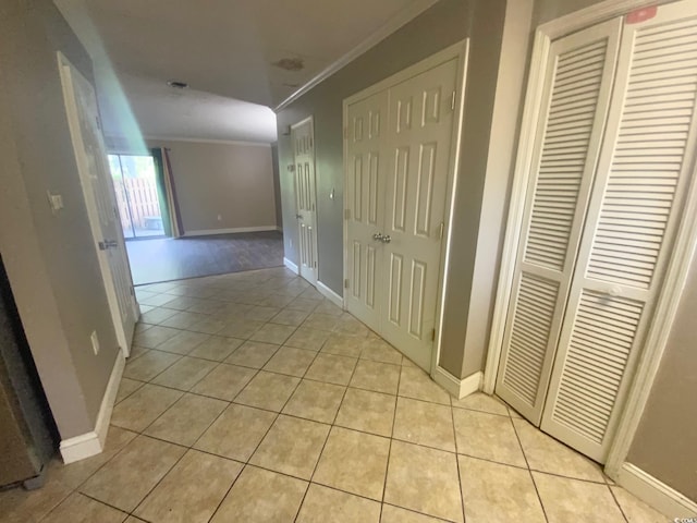 600 65th Ave N Unit 8, Myrtle Beach, SC 29572 - corridor featuring light tile patterned floors, crown molding, and baseboards