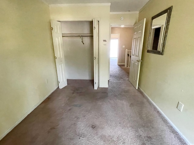 600 65th Ave N Unit 8, Myrtle Beach, SC 29572 - unfurnished bedroom featuring a closet, ornamental molding, carpet, and baseboards