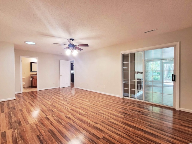 3904 Williamson Cir, Myrtle Beach, SC 29579 - spare room with wood finished floors, ceiling fan, baseboards, a textured ceiling, and recessed lighting