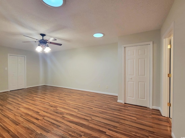 3904 Williamson Cir, Myrtle Beach, SC 29579 - unfurnished bedroom with wood finished floors, a textured ceiling, baseboards, ceiling fan, and recessed lighting