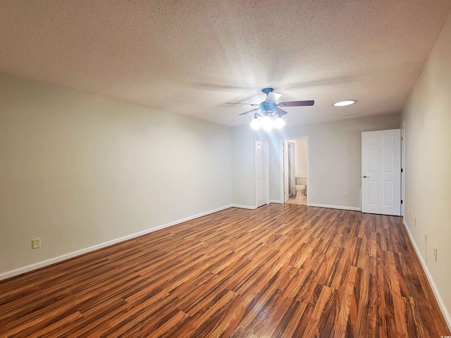 3904 Williamson Cir, Myrtle Beach, SC 29579 - spare room with wood finished floors, a ceiling fan, baseboards, and a textured ceiling