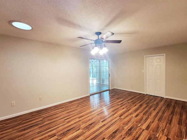 3904 Williamson Cir, Myrtle Beach, SC 29579 - spare room featuring wood finished floors, a ceiling fan, a textured ceiling, and baseboards