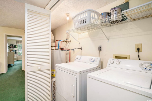 213 Westleton Dr Unit 16B, Myrtle Beach, SC 29572 - laundry area featuring washer and clothes dryer, water heater, dark colored carpet, and a textured ceiling