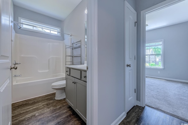 617 Chiswick Dr, Conway, SC 29526 - bathroom with toilet, vanity, bathing tub / shower combination, wood finished floors, and baseboards