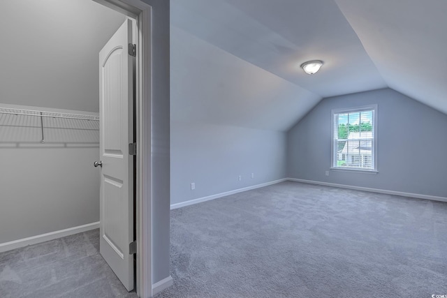 617 Chiswick Dr, Conway, SC 29526 - bonus room featuring lofted ceiling, carpet, and baseboards
