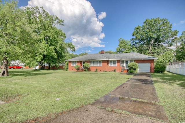 2004 Seitter St, Georgetown, SC 29440 - single story home with an attached garage, brick siding, concrete driveway, and a chimney
