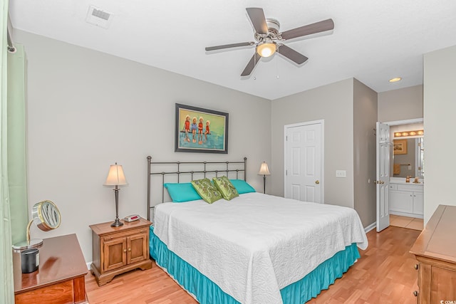 503 20th Ave N Unit 15B, North Myrtle Beach, SC 29582 - bedroom with light wood-style floors, baseboards, connected bathroom, a ceiling fan, and recessed lighting