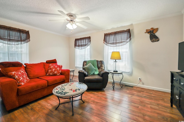 263 Walden Lake Rd, Conway, SC 29526 - living area with a textured ceiling, a ceiling fan, hardwood / wood-style floors, ornamental molding, and baseboards