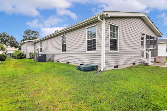 263 Walden Lake Rd, Conway, SC 29526 - view of property exterior with crawl space, a lawn, entry steps, and central air condition unit