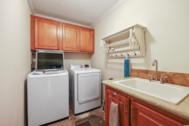263 Walden Lake Rd, Conway, SC 29526 - laundry area featuring separate washer and dryer, cabinet space, crown molding, and a textured ceiling