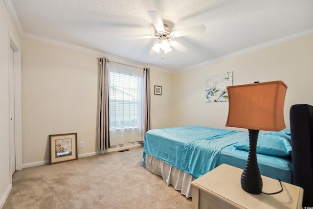 263 Walden Lake Rd, Conway, SC 29526 - bedroom with ornamental molding, a textured ceiling, light carpet, baseboards, and ceiling fan