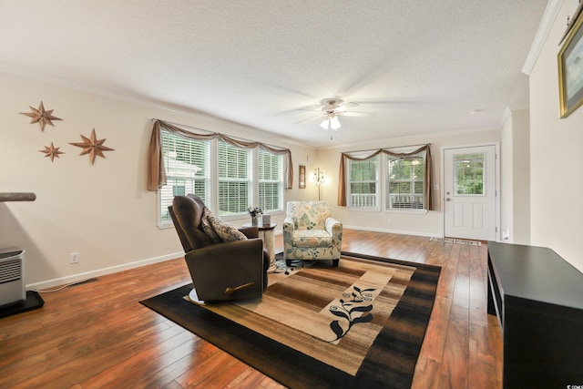 263 Walden Lake Rd, Conway, SC 29526 - living area featuring wood-type flooring, crown molding, ceiling fan, healthy amount of natural light, and baseboards