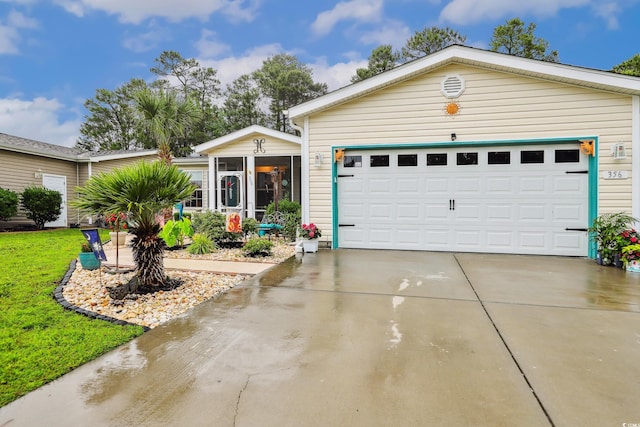 356 Lakeside Crossing Dr, Conway, SC 29526 - single story home featuring driveway, a garage, and a sunroom