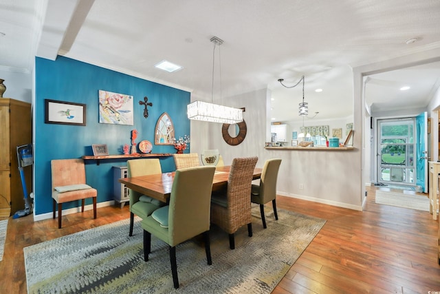 356 Lakeside Crossing Dr, Conway, SC 29526 - dining room featuring crown molding, wood-type flooring, baseboards, a chandelier, and recessed lighting