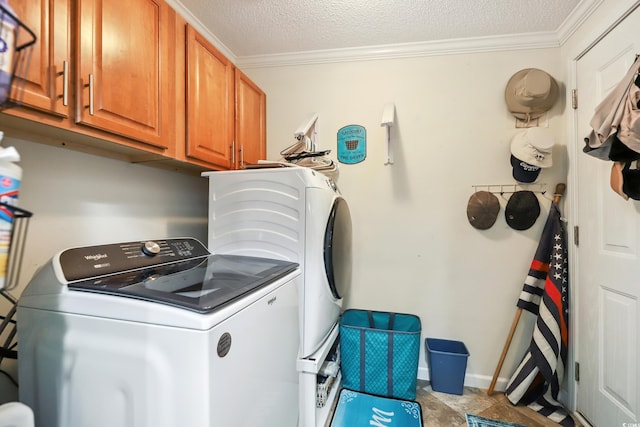 356 Lakeside Crossing Dr, Conway, SC 29526 - laundry area featuring cabinet space, washing machine and dryer, ornamental molding, and a textured ceiling
