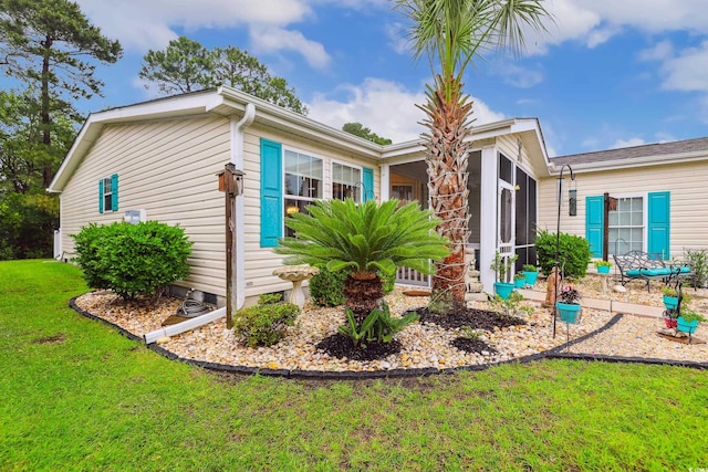 356 Lakeside Crossing Dr, Conway, SC 29526 - view of front of house with a sunroom and a front yard