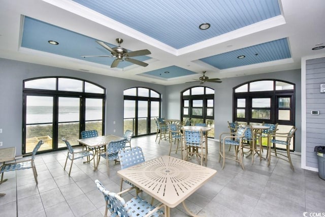 2180 Waterview Dr Unit 635, North Myrtle Beach, SC 29582 - dining area with a ceiling fan, a raised ceiling, coffered ceiling, a water view, and beam ceiling