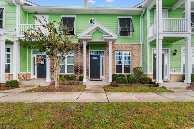 788 Gabreski Ln Unit B4, Myrtle Beach, SC 29577 - townhome / multi-family property with brick siding and a balcony