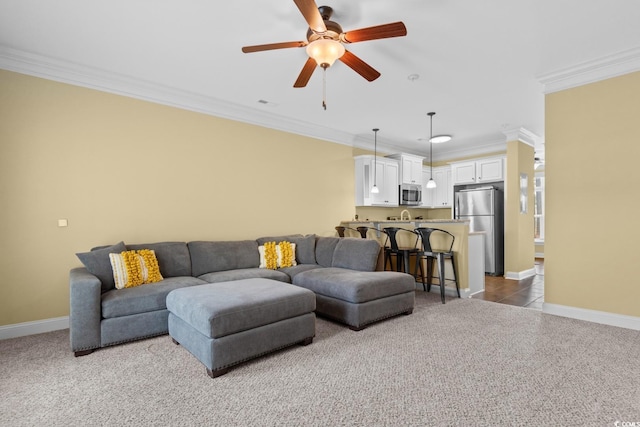 788 Gabreski Ln Unit B4, Myrtle Beach, SC 29577 - carpeted living room featuring a ceiling fan, crown molding, and baseboards