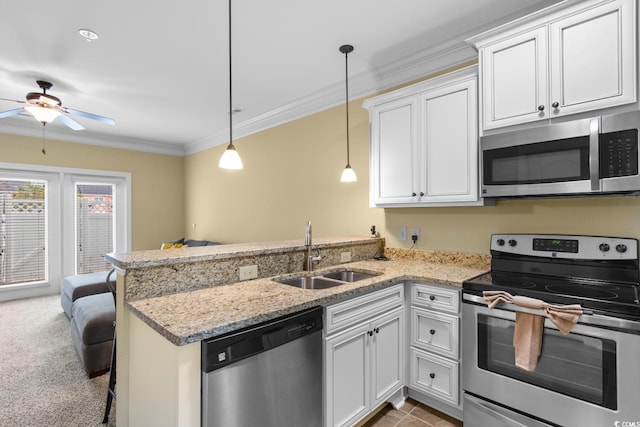 788 Gabreski Ln Unit B4, Myrtle Beach, SC 29577 - kitchen featuring appliances with stainless steel finishes, a sink, a peninsula, crown molding, and a ceiling fan