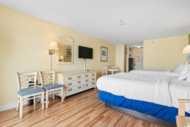 1207 S Ocean Blvd Unit 51001, Myrtle Beach, SC 29577 - bedroom with wood finished floors and baseboards