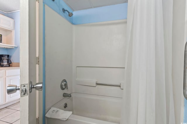 1207 S Ocean Blvd Unit 51312, Myrtle Beach, SC 29577 - bathroom with shower / bathtub combination with curtain and tile patterned flooring
